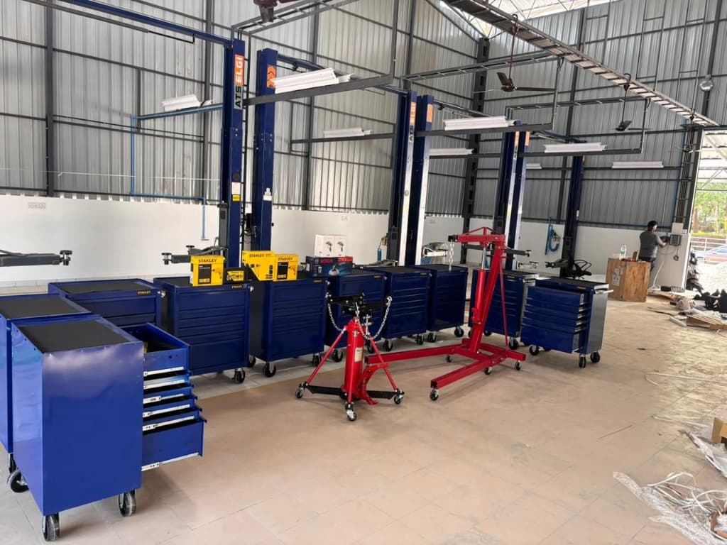 Hexamech Linich Tools Car Lift Installation with Tool Cabinets